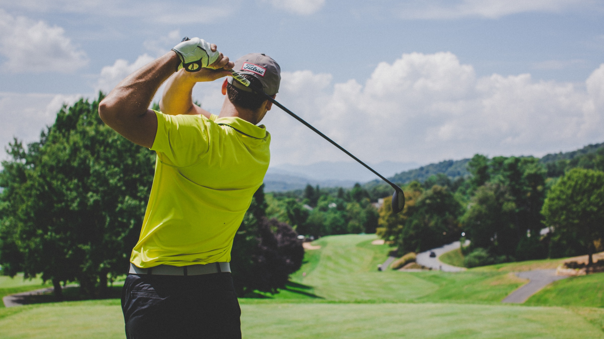 Golfer Driving on Golf Course